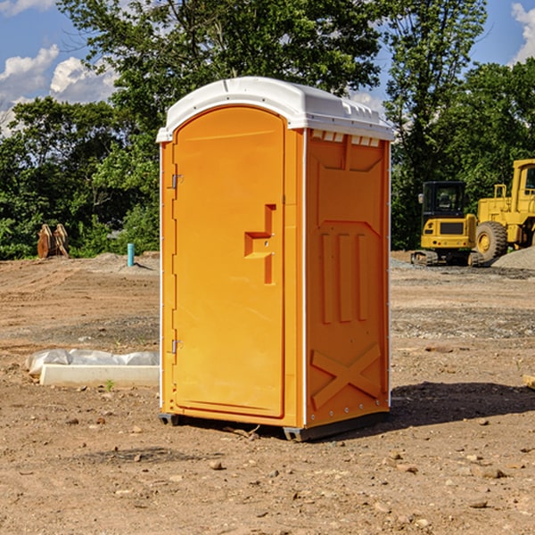 how often are the portable restrooms cleaned and serviced during a rental period in Sayner